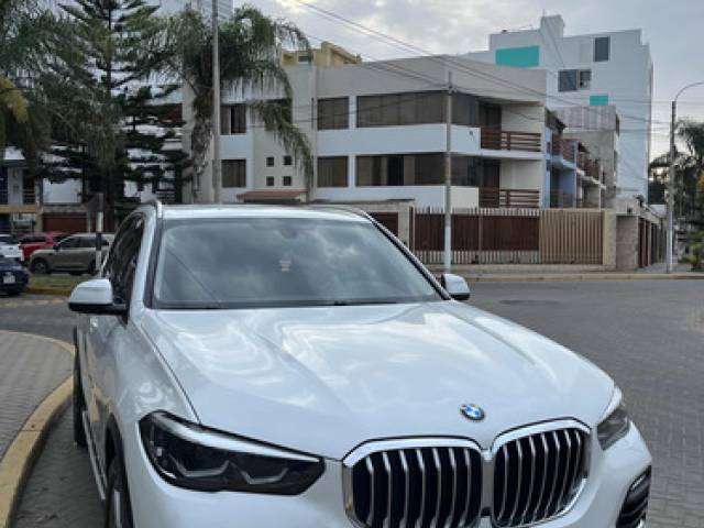 BMW X5 Blanco mineral gasolina $60.000